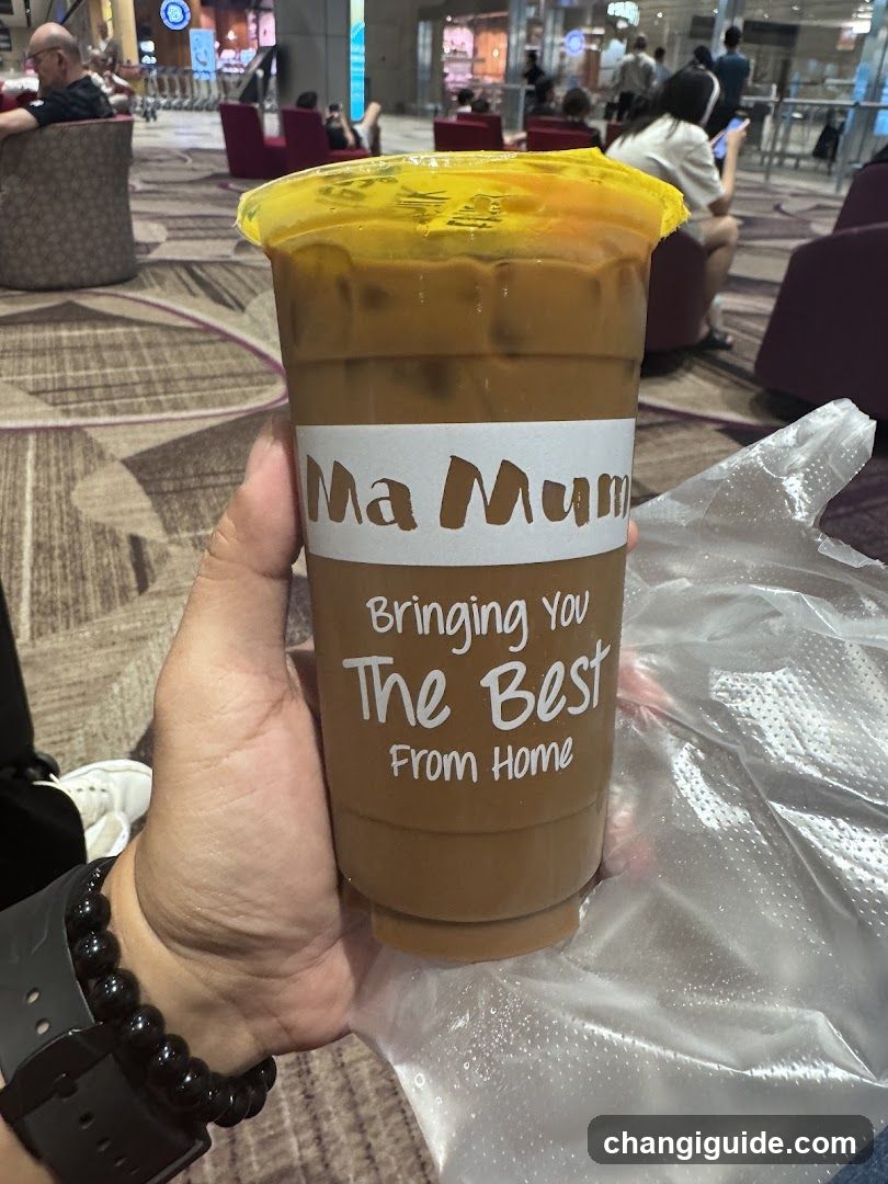Iced coffee cup held in hand
