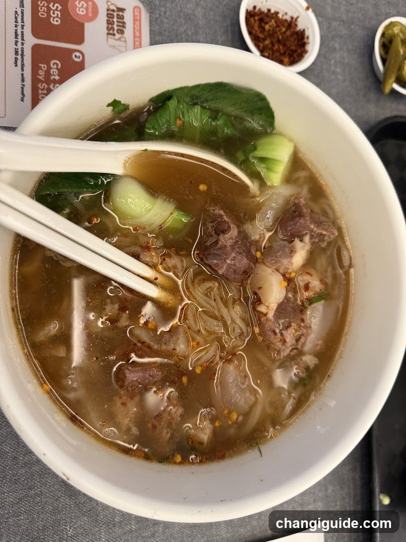 Bowl of Noodle Soup with Chopsticks