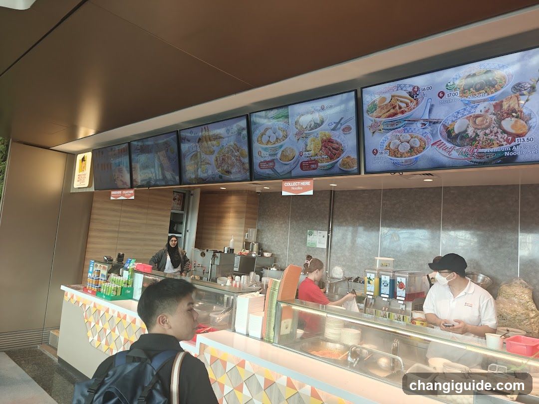 Food Counter with Staff and Menu Boards