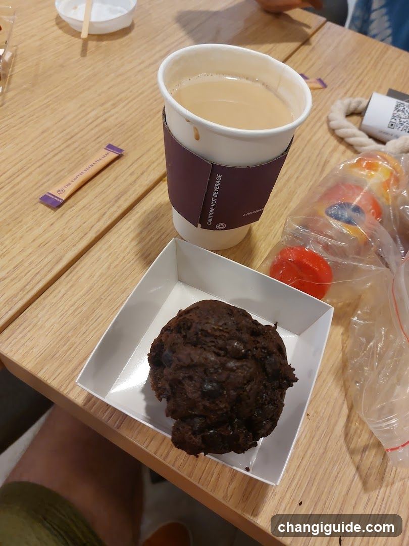 Coffee and Pastry on Wooden Table
