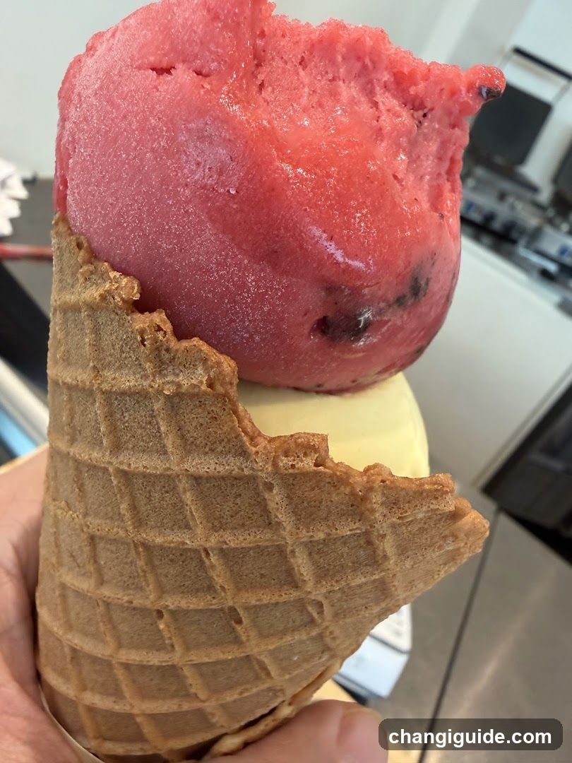 Ice Cream Cone with Pink and Yellow Scoops