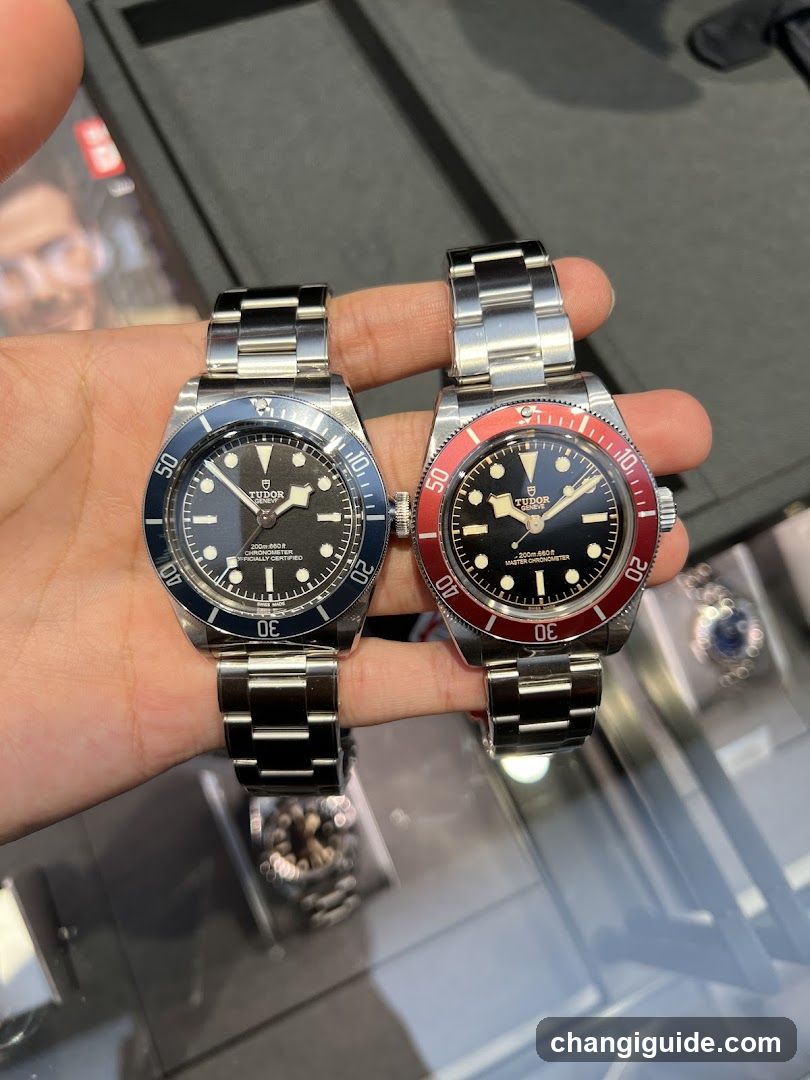 Two Seiko Diver Watches Held in Hand