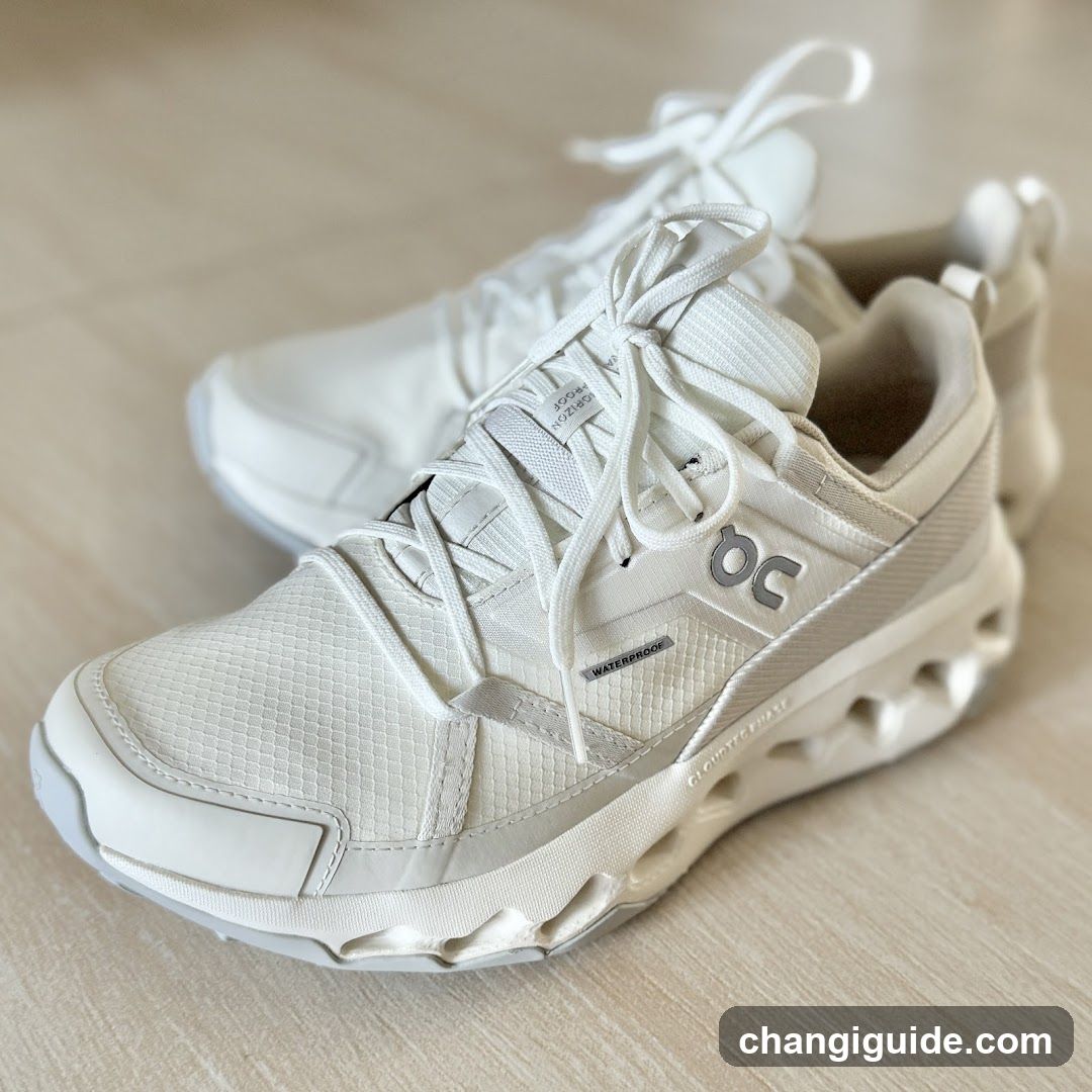 White OCN shoes on wooden floor