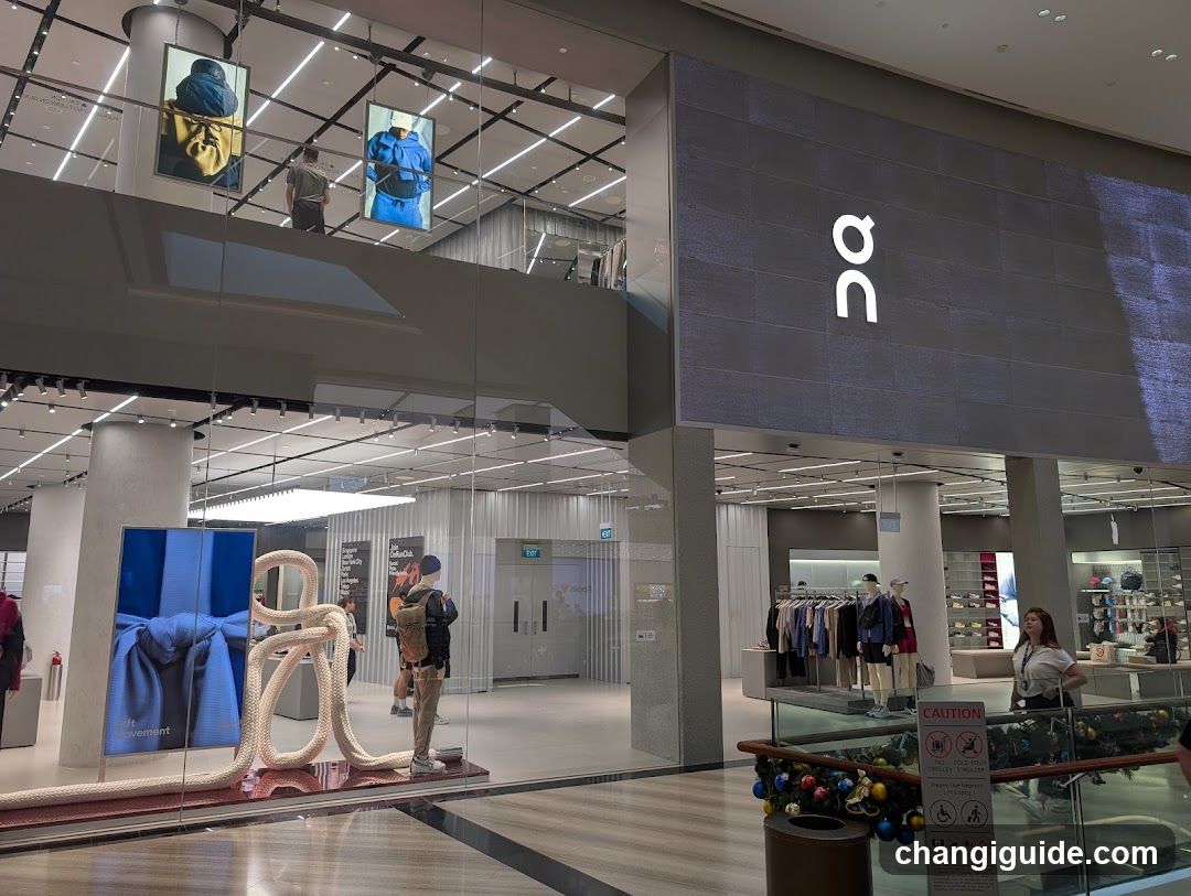 Shopping Mall Interior with Storefronts and Displays