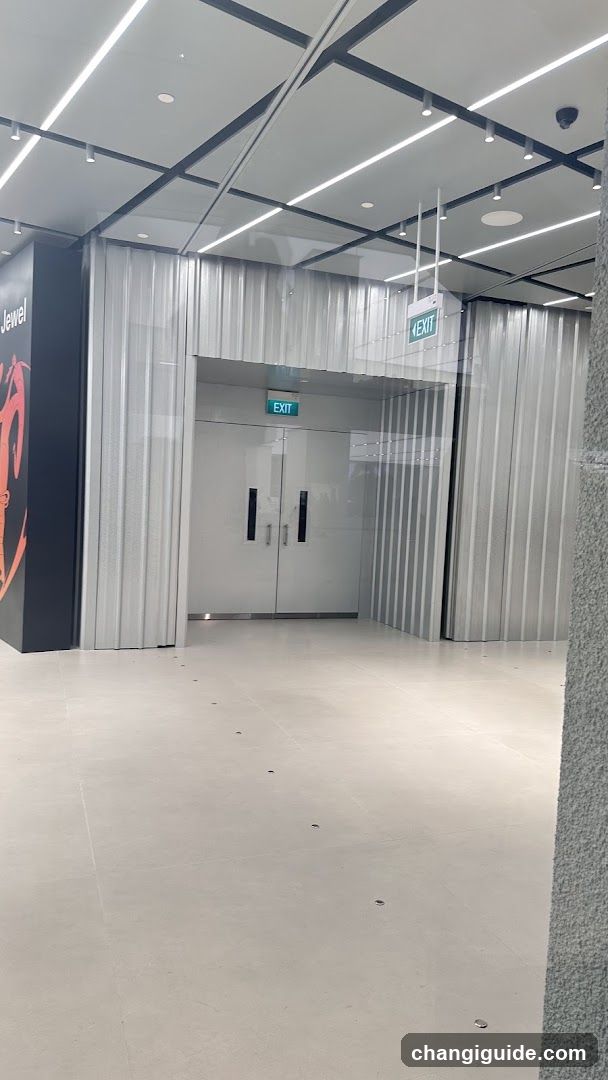 Empty Interior Space with Exit Signs