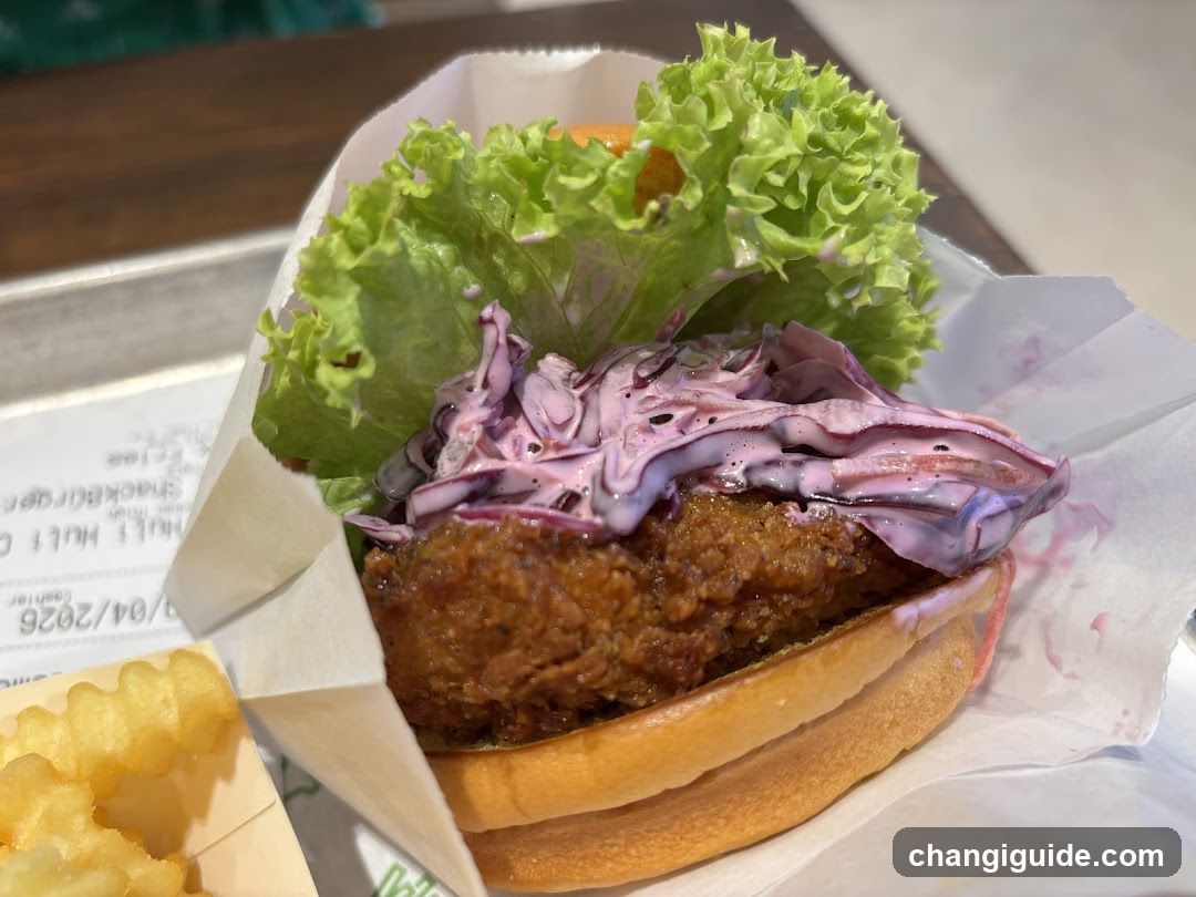 Burger with Coleslaw and Crinkle Cut Fries