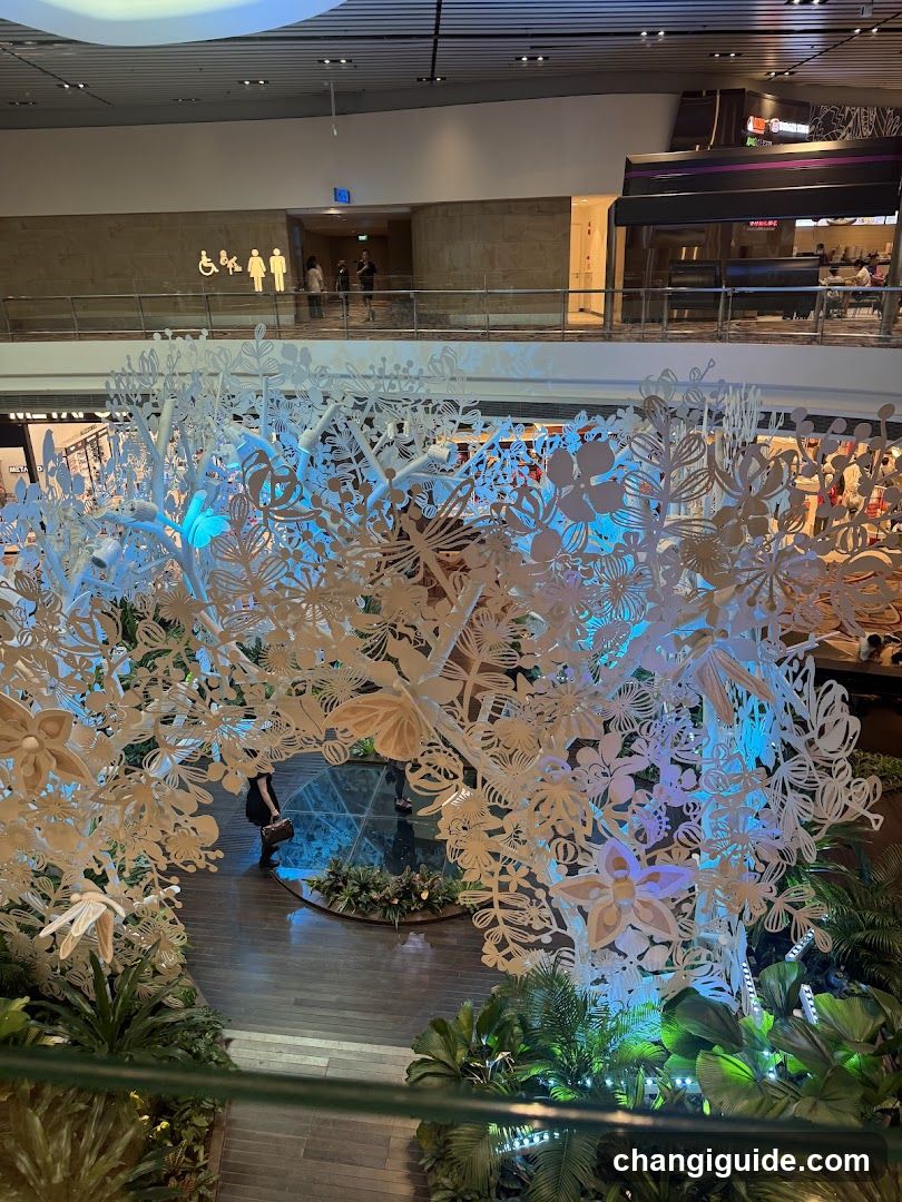 Indoor Mall Interior with Floral Installation
