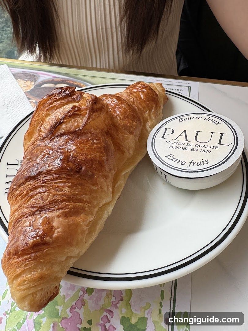 Croissant and Butter on a Plate