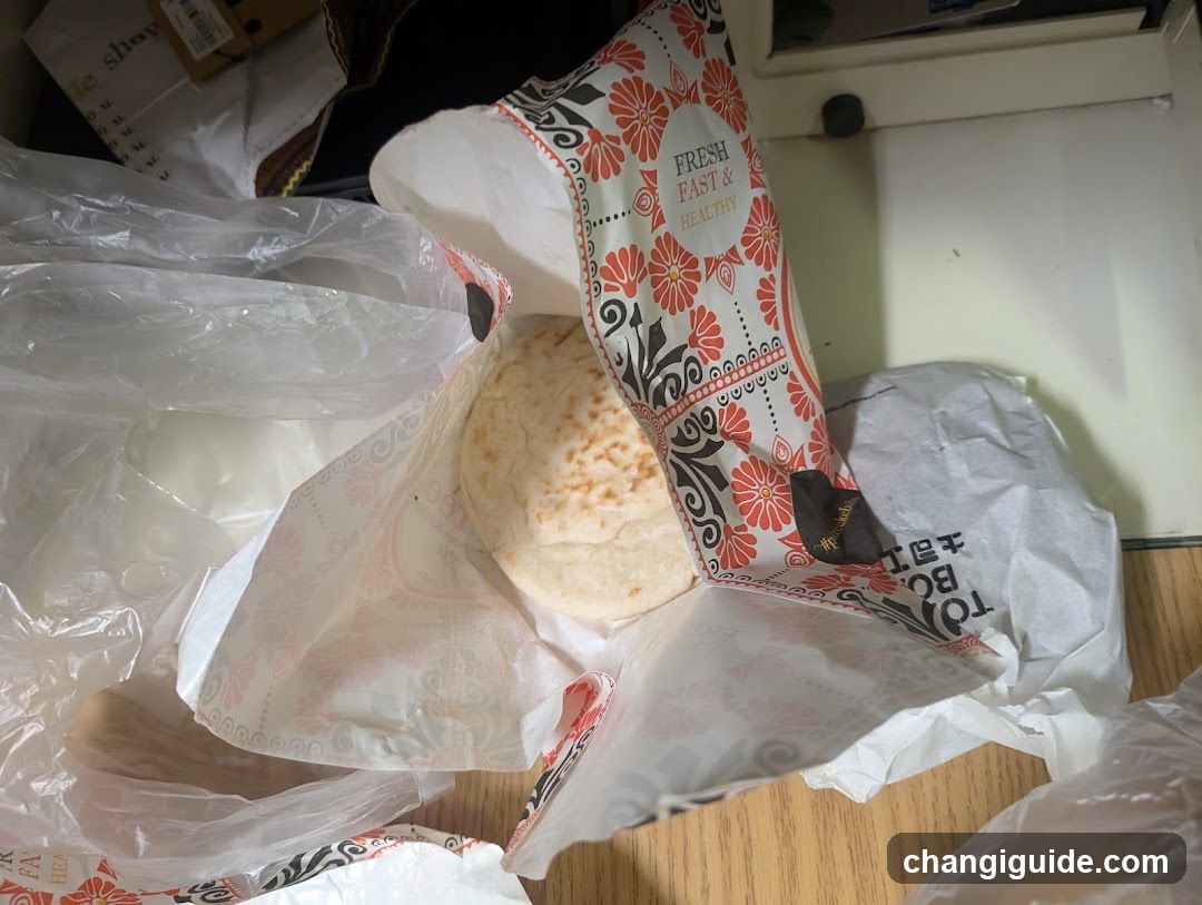 Unwrapped Flatbread in Packaging