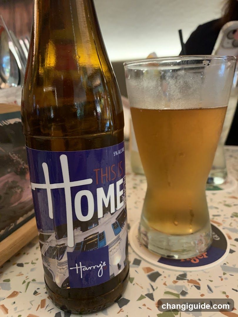 Beer Bottle and Glass on Table