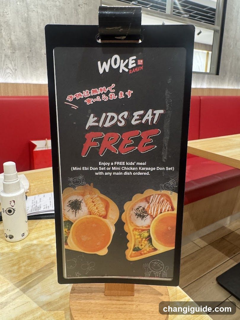 Kids Eat Free Signage at Woke Ramen