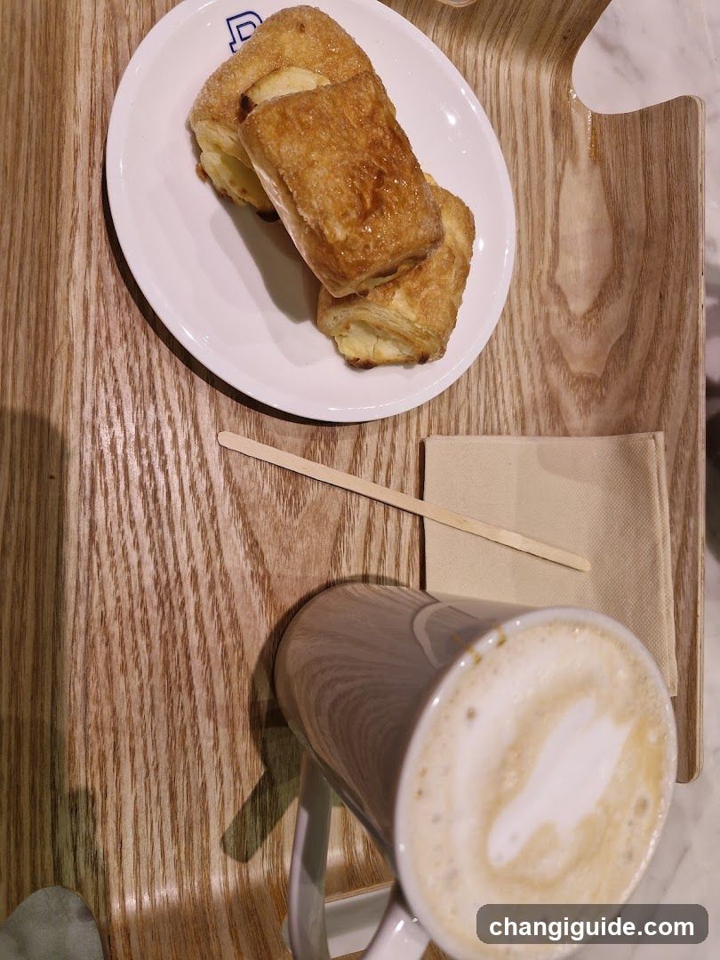 Coffee and Pastry on Wooden Tray