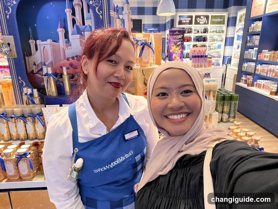 Staff and customer selfie in store