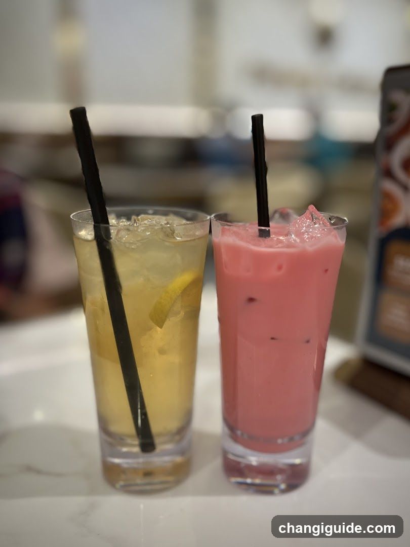 Two Iced Drinks with Straws