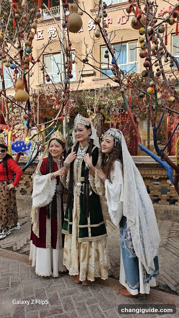 Traditional Costumes in Decorative Setting