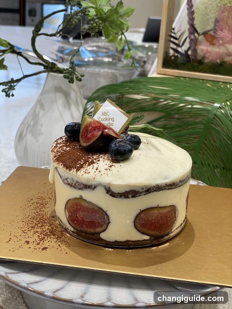 Fig and Blueberry Cake with ABC Cooking Studio Sign