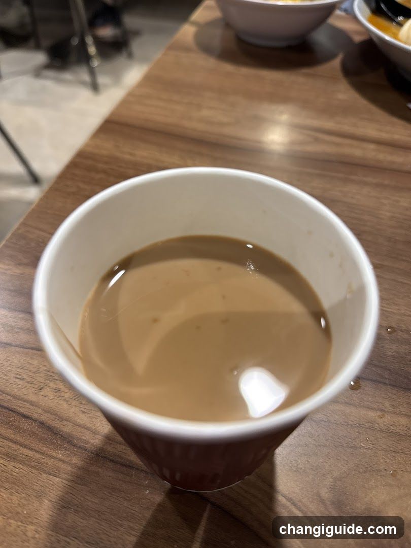 Cup of coffee on wooden table