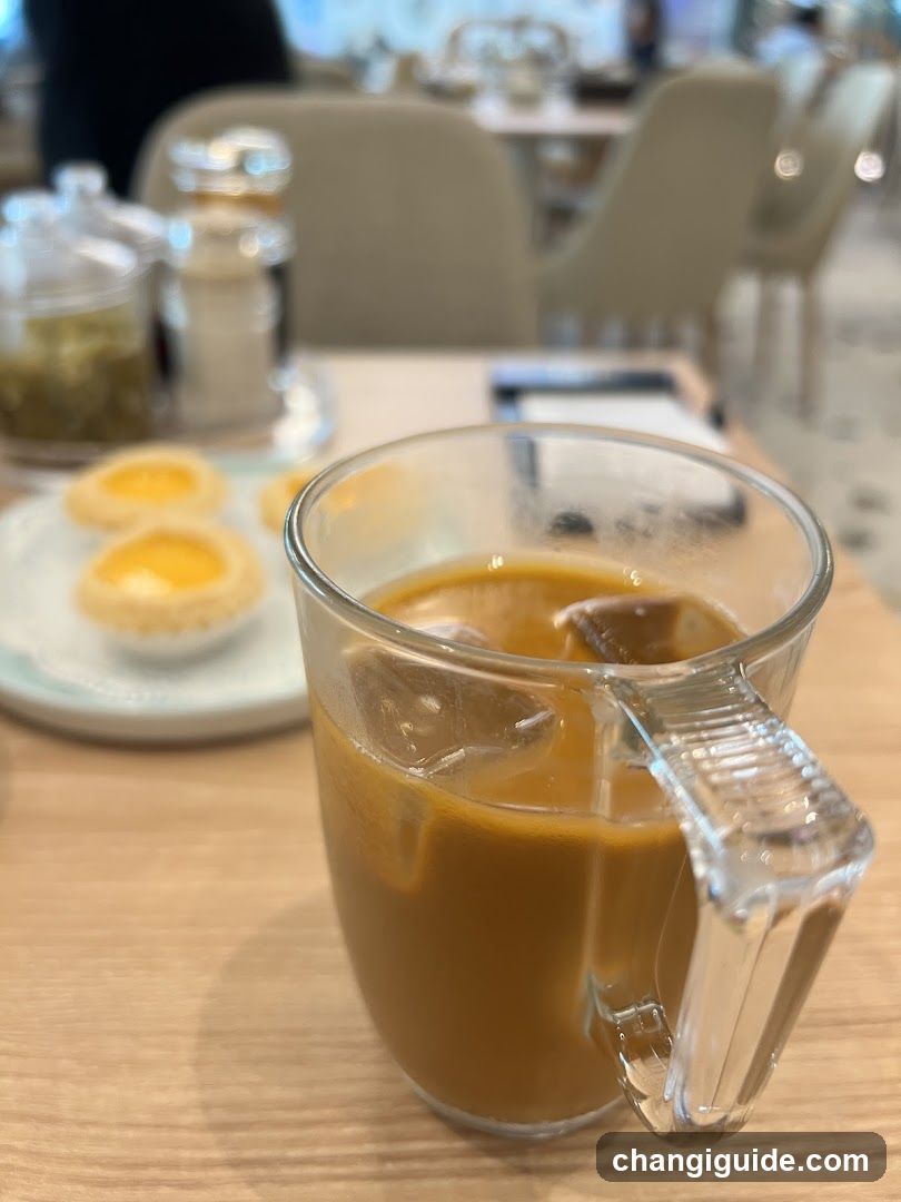 Iced Coffee and Egg Tarts at a Cafe