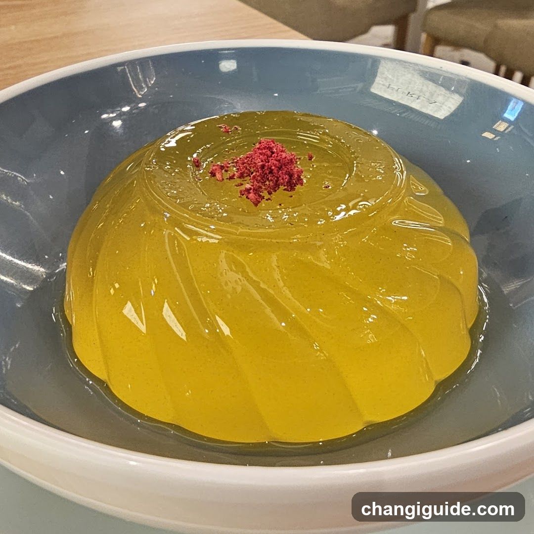 Yellow Jello Dessert with Red Garnish