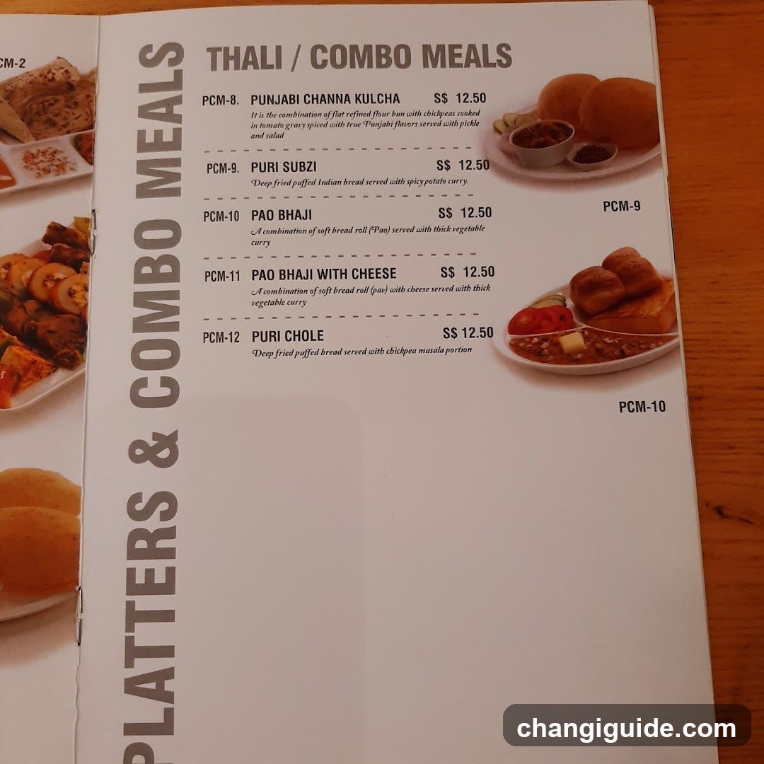 A printed menu page displaying Thali and Combo Meal options with prices in Singapore Dollars (SS). The layout includes item codes, names, descriptions, and corresponding photos of the dishes.