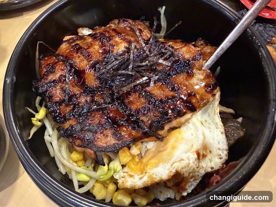 Grilled Chicken Rice Bowl with Fried Egg and Corn
