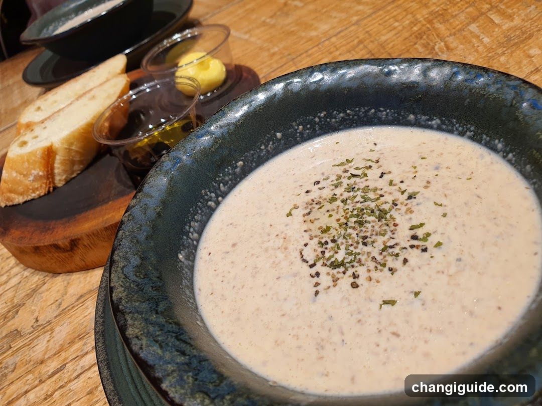 Creamy Soup with Bread and Condiments