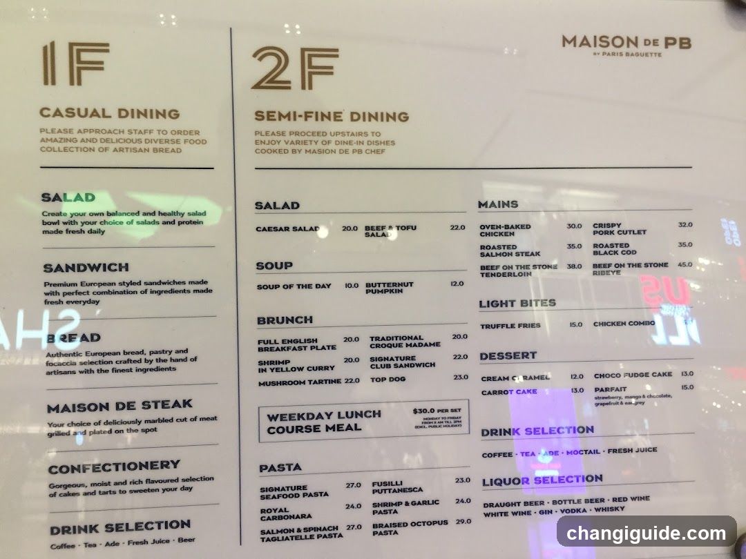 A printed menu board displaying two dining levels (1F and 2F) with sections for salad, sandwich, bread, steak, confectionery, drinks, pasta, mains, light bites, dessert, and liquor selection.