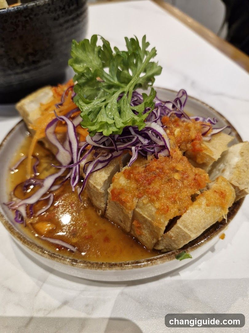 Sliced Fried Tofu with Garlic Sauce and Cabbage Slaw