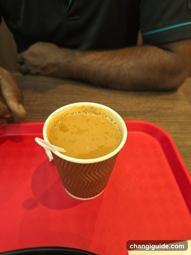 Cup of coffee on red tray