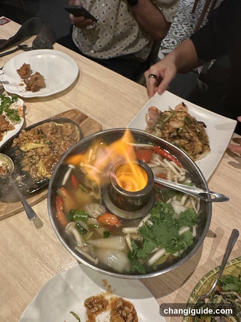 Dining Table with Hot Pot and Side Dishes