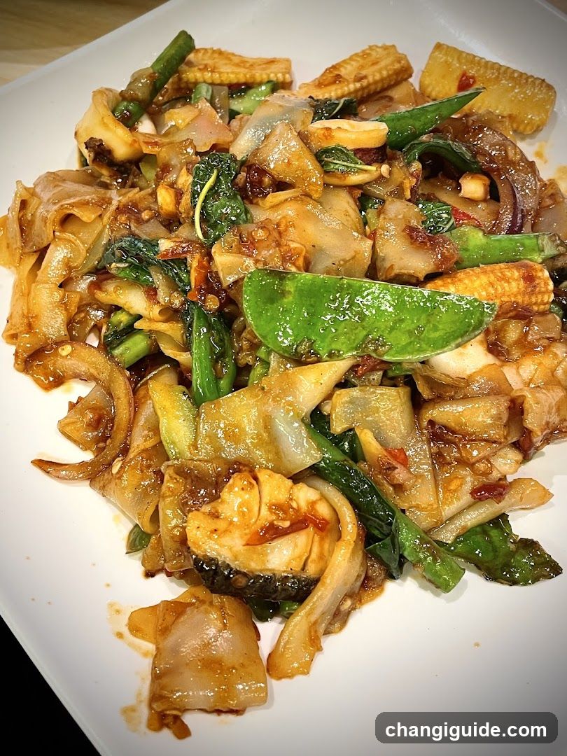 Stir-fried Noodles with Vegetables and Fish
