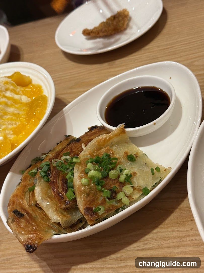 Pan-fried Dumplings with Sauce and Mango Salad