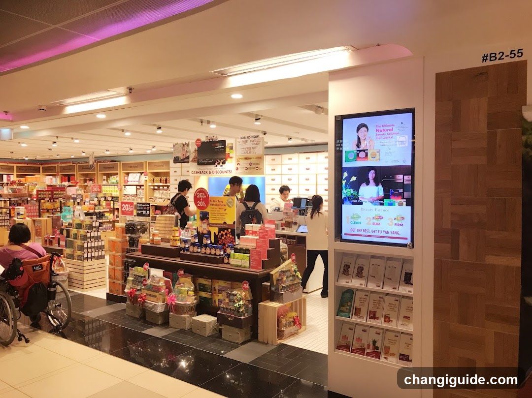 Interior of a retail store with promotional displays and digital signage.