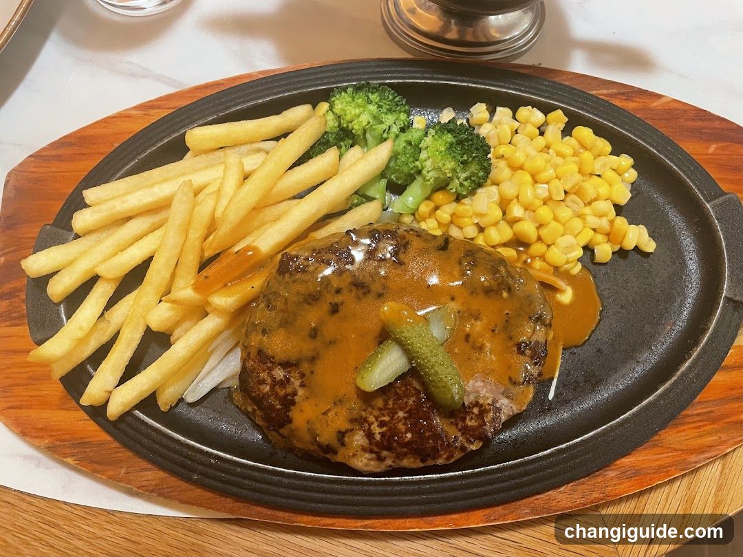 Sizzling Steak Plate with Fries, Corn and Broccoli
