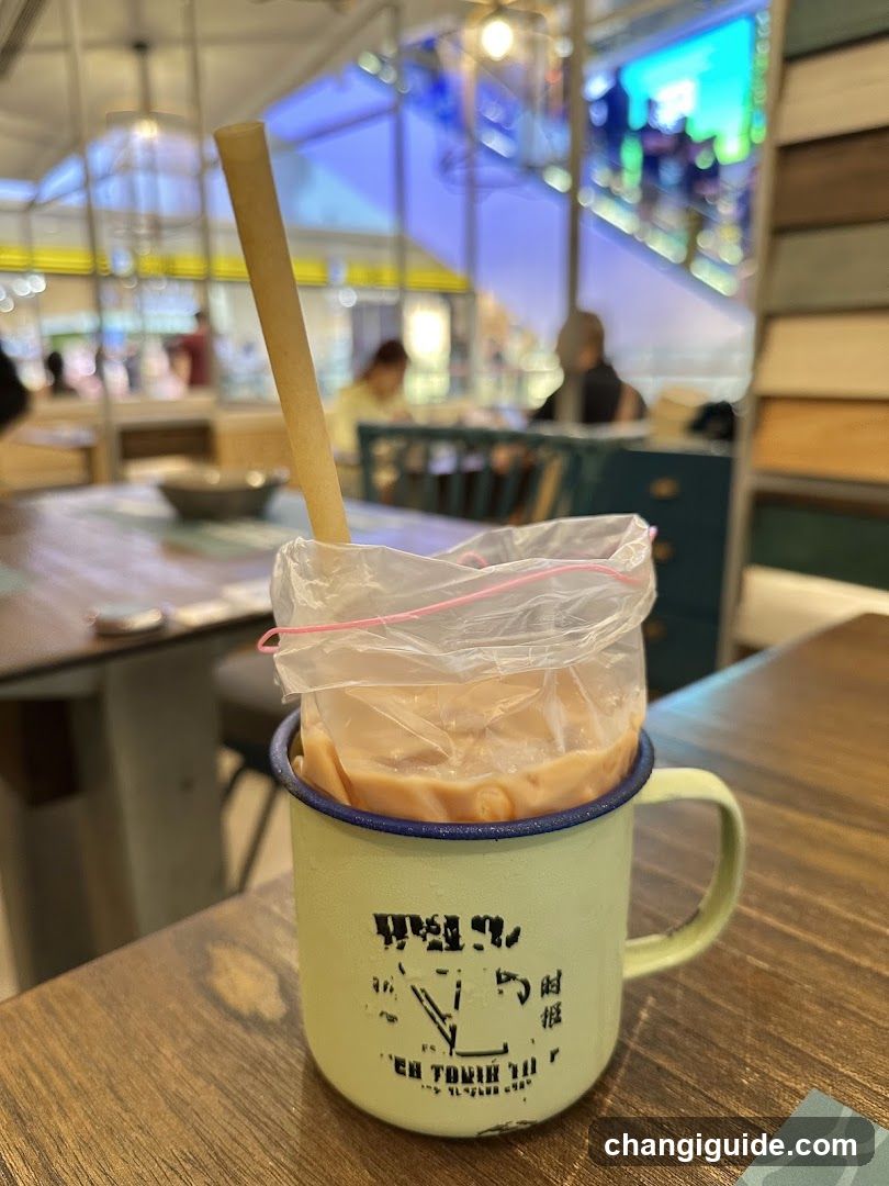 Beverage in enamel mug at cafe
