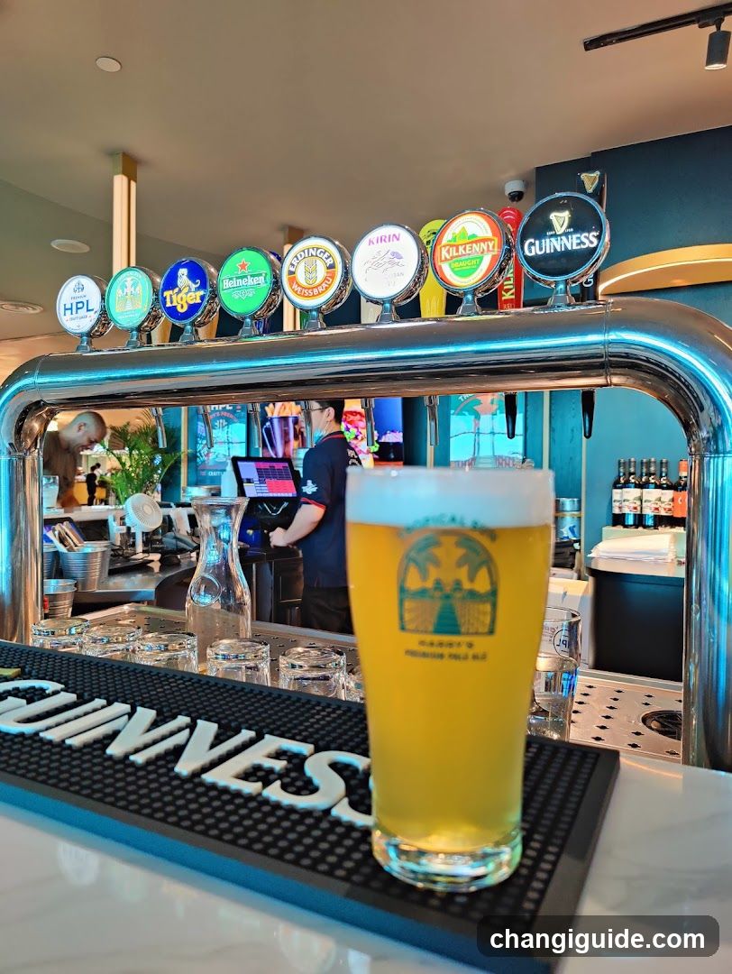 Beer Taps and Pint at Bar Counter