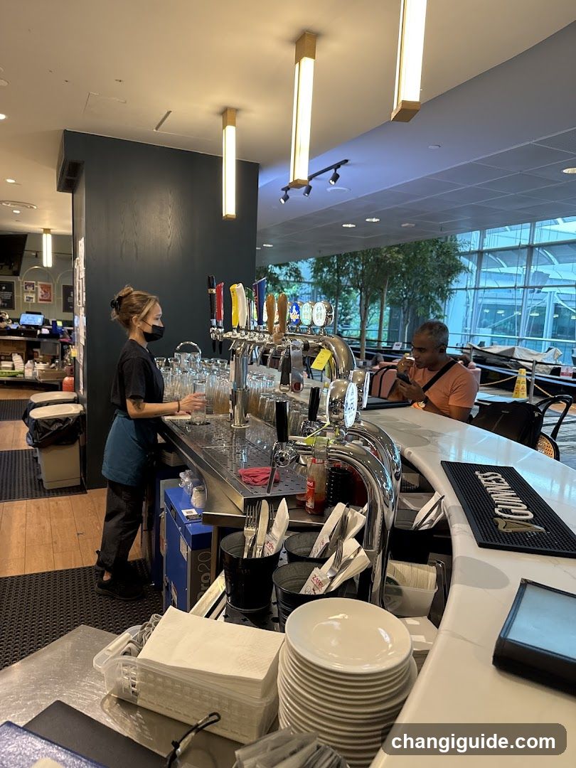 Bar Interior with Staff and Customer
