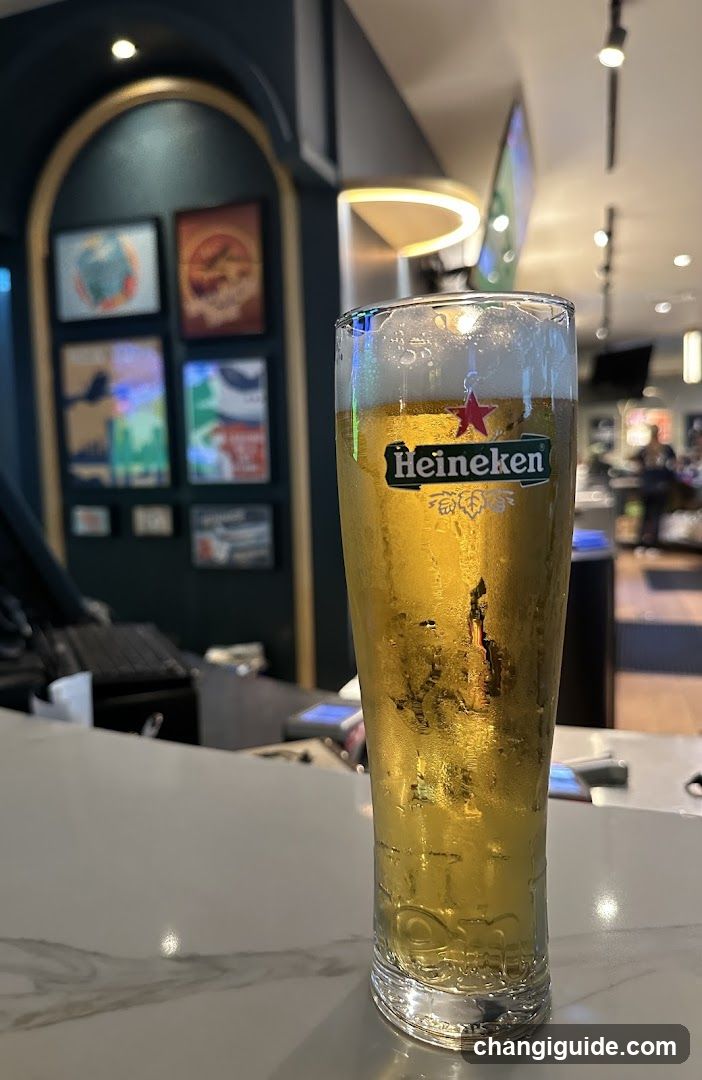 Heineken Beer Glass in Bar Interior