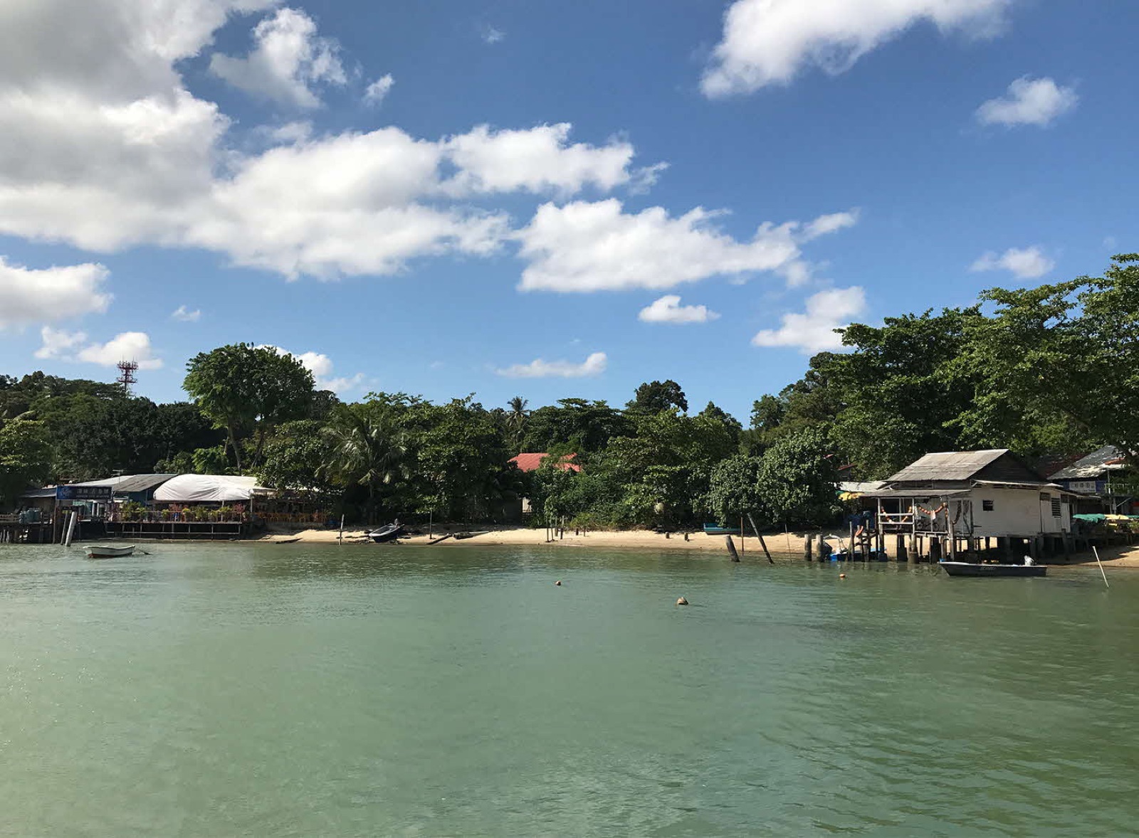 Pulau Ubin village shoreline seen from the bumboat arriving from Changi Point