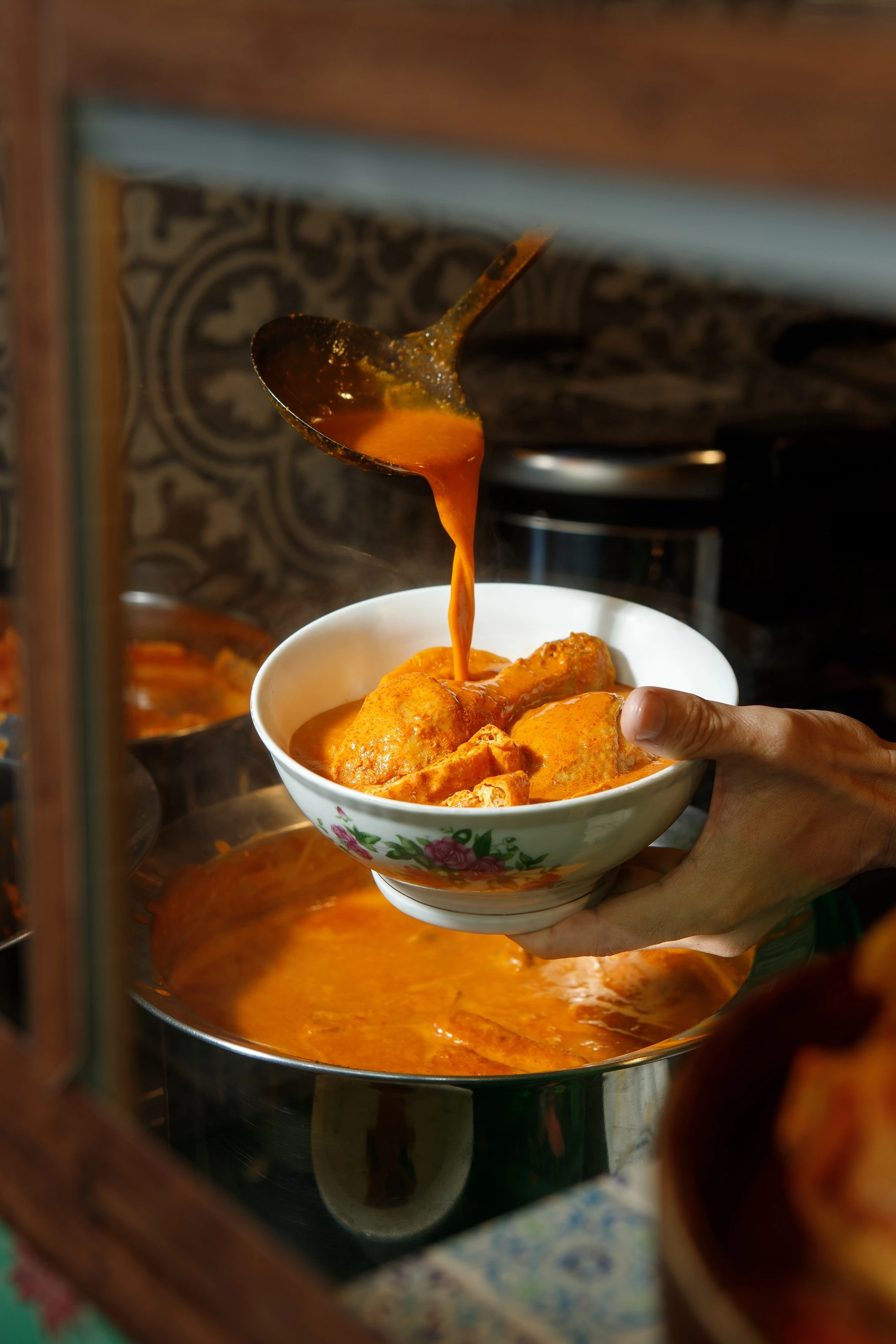 Na Na Homemade Curry Peranakan fish head curry, a 10-year Michelin Bib Gourmand stall at Food Republic Jewel
