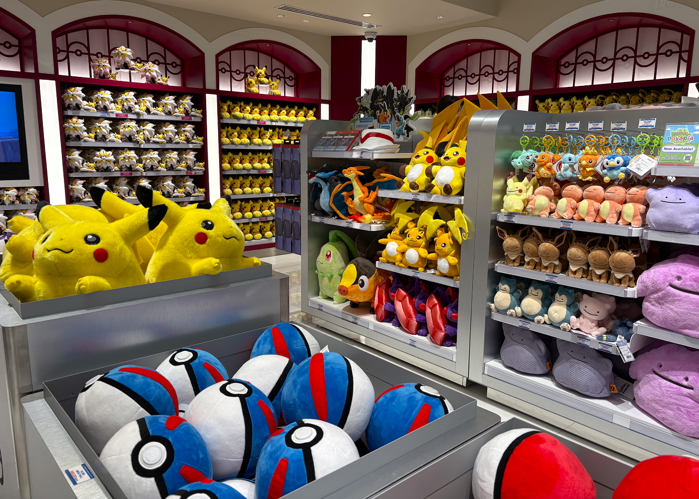 Organised plushies retail section inside the reopened Pokémon Center Singapore at Jewel