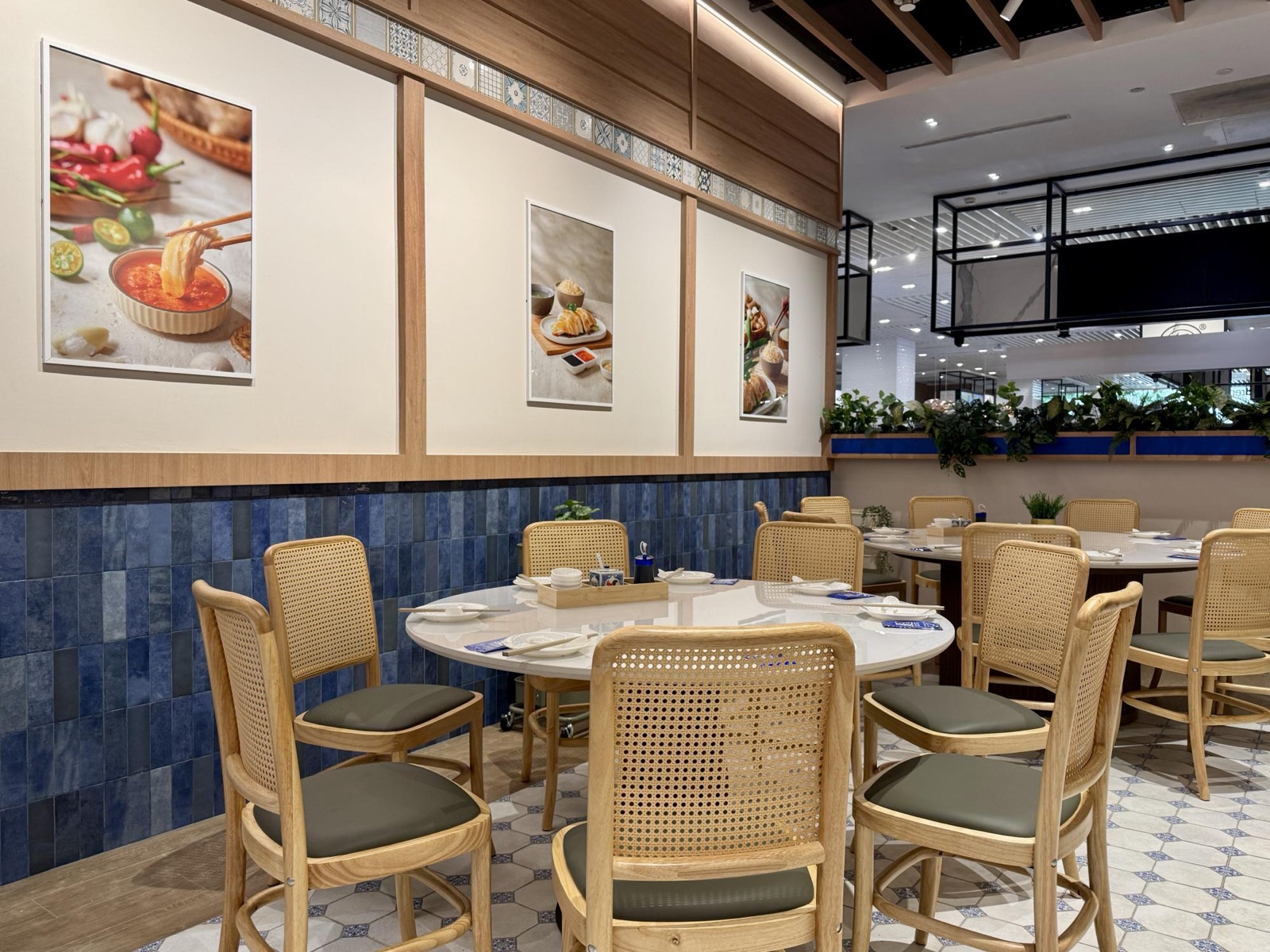 Rattan chairs and blue-tile dining room at Tian Tian flagship, Jewel Basement 2