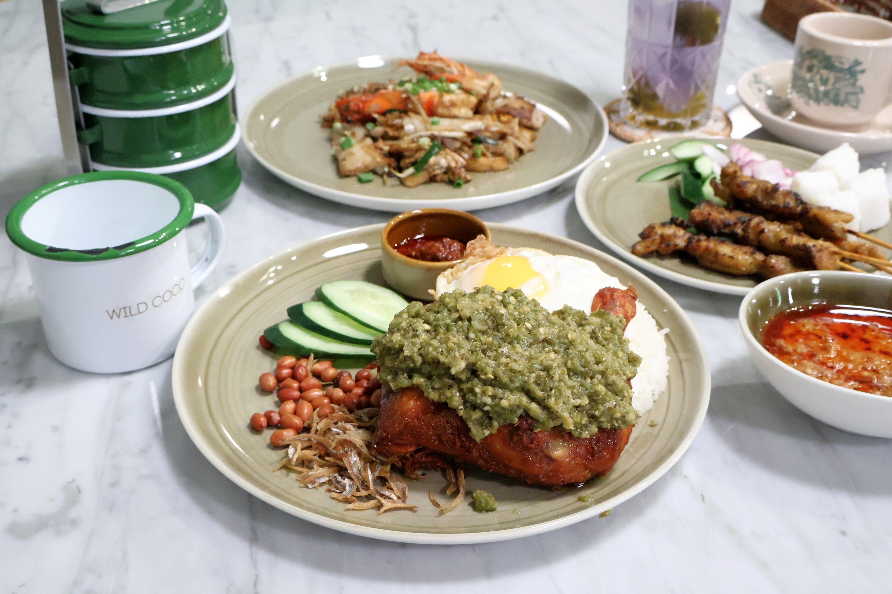 Wild Coco Opens Flagship at Jewel Changi With Rain Vortex Views and Nasi Lemak